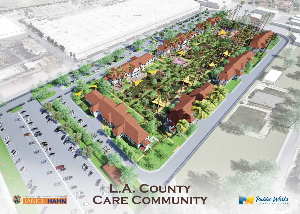 Aerial rendering of a planned L.A. County Care Community featuring multiple two-story buildings with red tile roofs arranged around landscaped green courtyards. The central area includes walking paths, palm trees, shaded seating areas with yellow canopy sails, playground spaces, and community gathering areas. Parking lots with numerous cars surround the complex, with streets on all sides and a large industrial building adjacent. Text at the bottom reads “L.A. County Care Community,” alongside the Janice Hahn Fourth District and Los Angeles County Public Works logos.